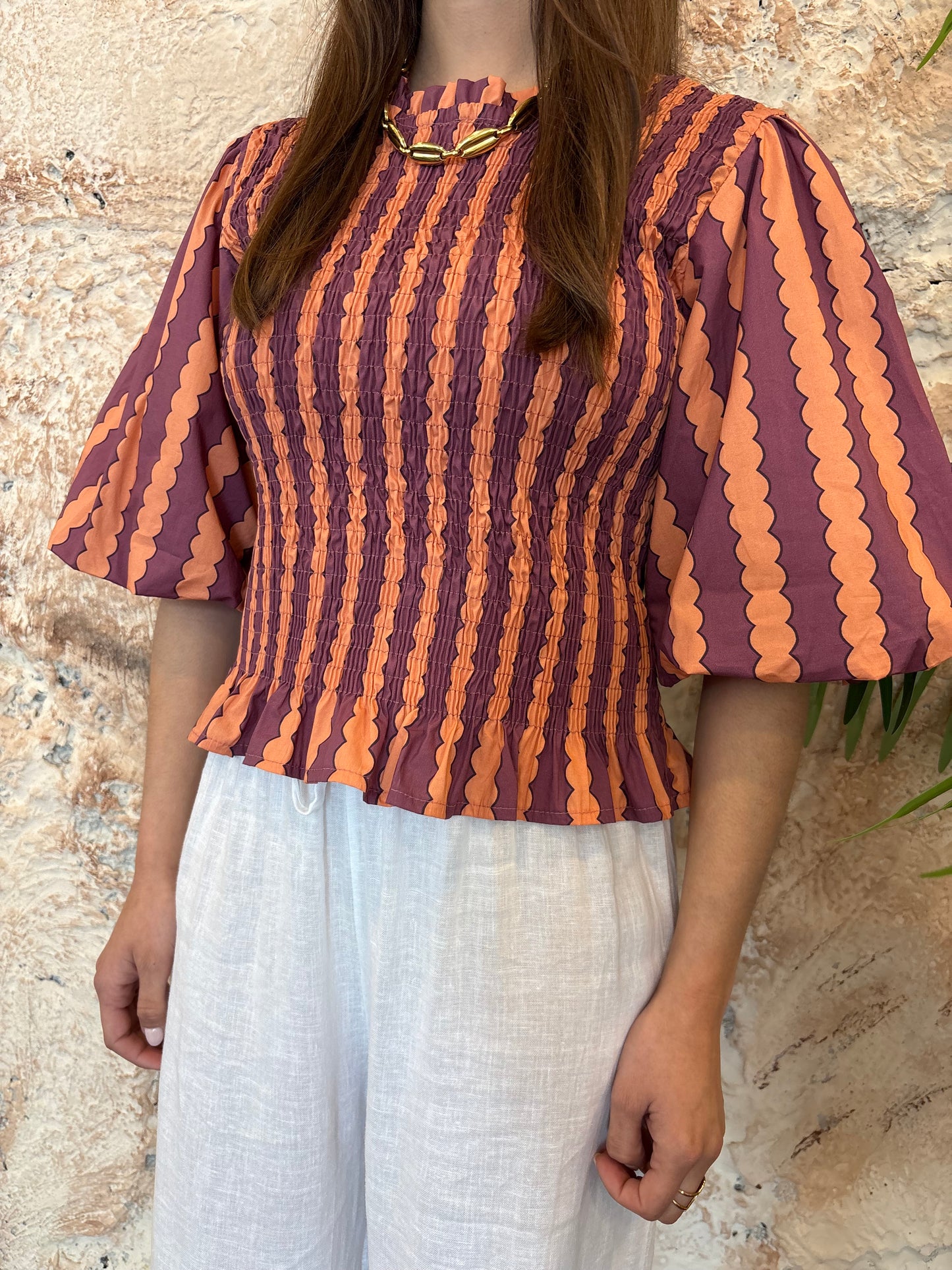 BLUSA ESTAMPADA PANEL NARANJA-MORADO