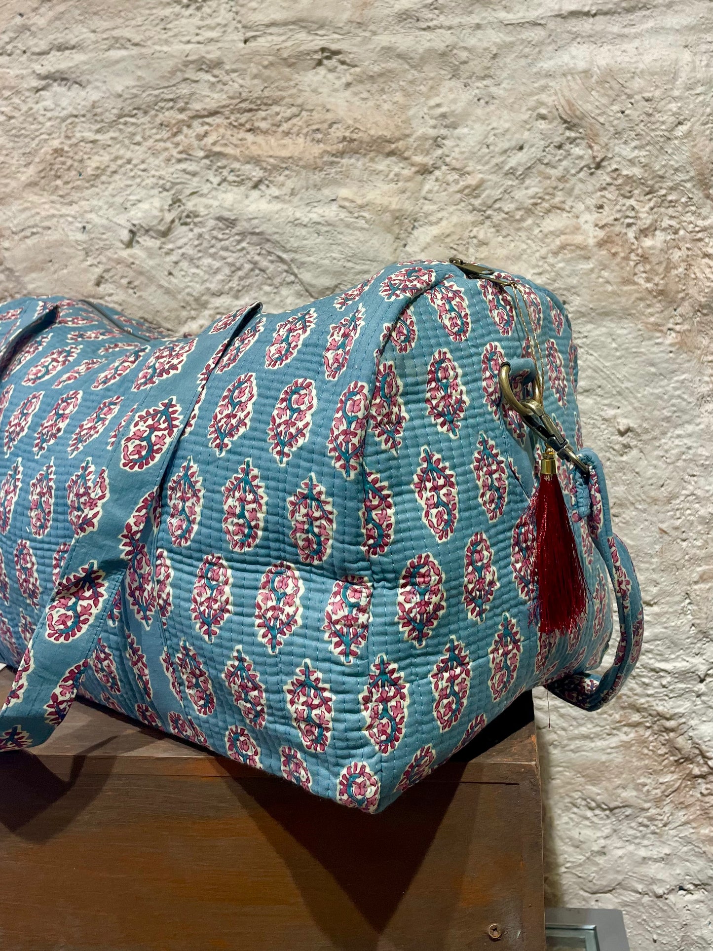 BOLSO VIAJE ESTAMPADO AZUL PETRÓLEO