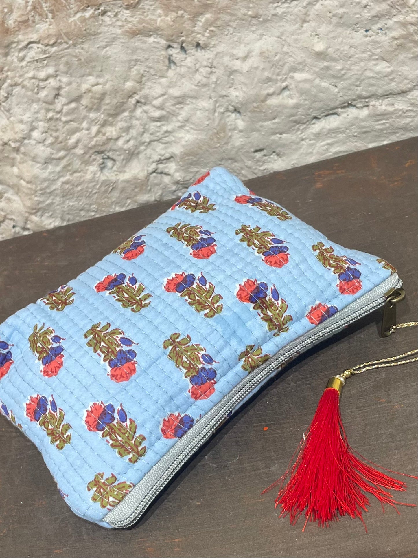 NECESER ESTAMPADO CELESTE