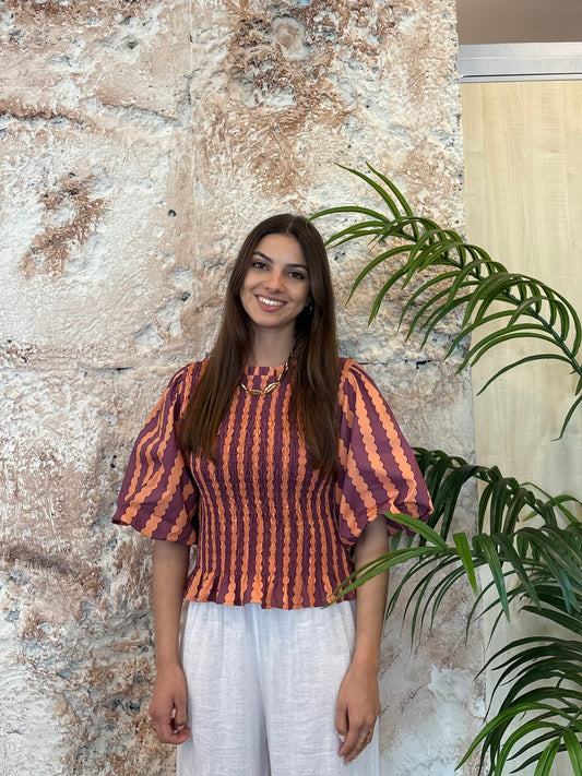 BLUSA ESTAMPADA PANEL NARANJA-MORADO