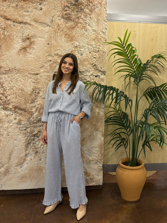 PANTALÓN FLUIDO CELESTE RAYAS VOLANTE