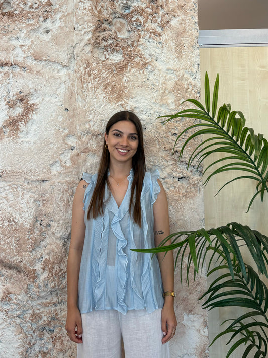 BLUSA FLUIDA VOLANTES CELESTE
