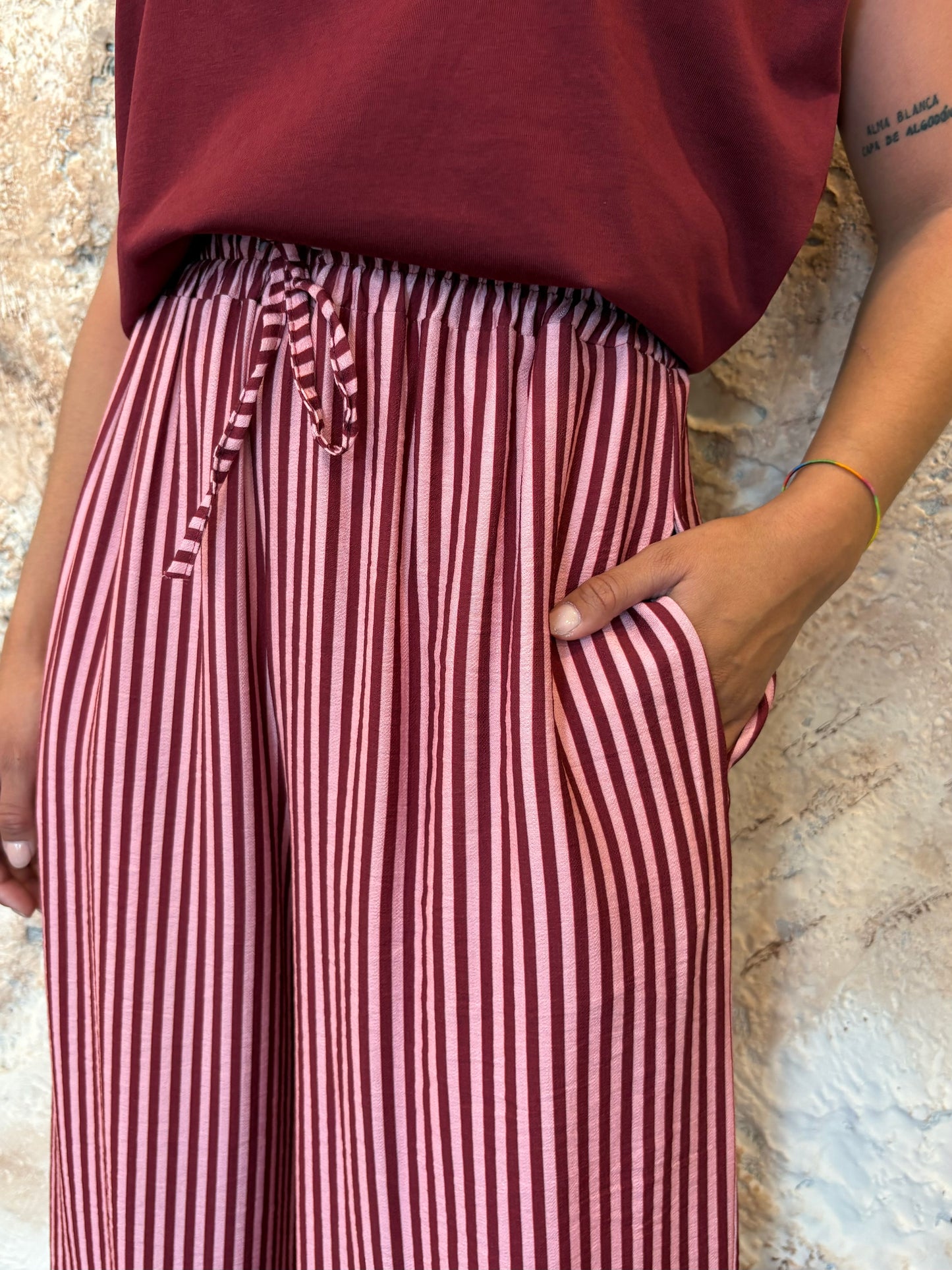 PANTALÓN FLUIDO RAYAS ROSA Y MORADO