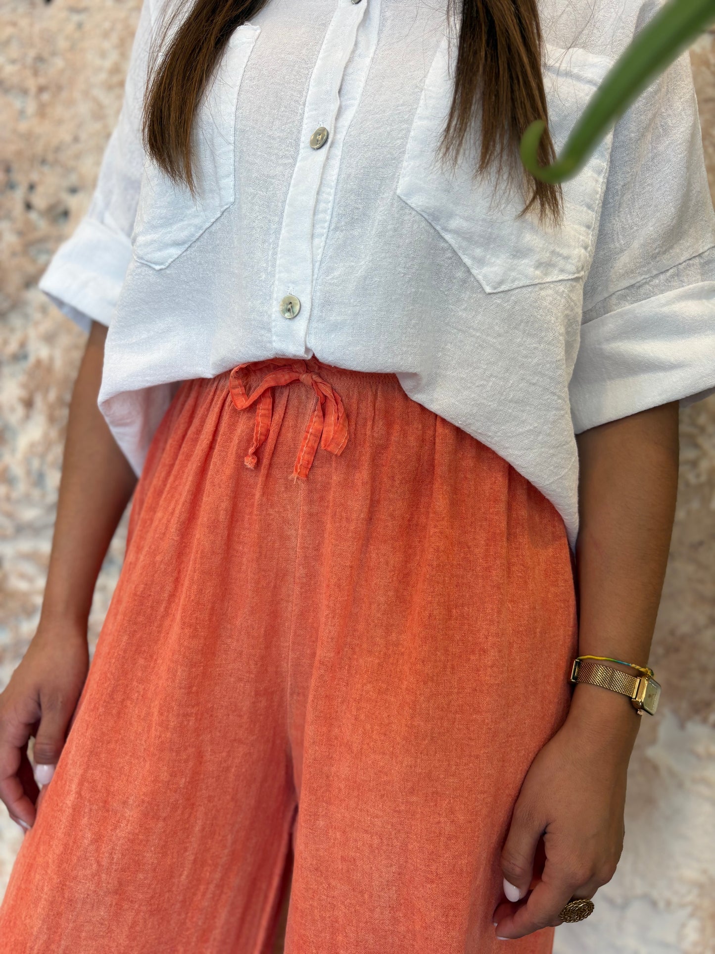 PANTALÓN EFECTO LINO NARANJA BAJO DESFLECADO
