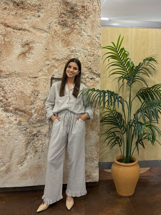 PANTALÓN FLUIDO BEIGE RAYAS VOLANTE