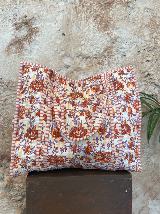 SHOPPER ACOLCHADO ESTAMPADO NARANJA Y MALVA