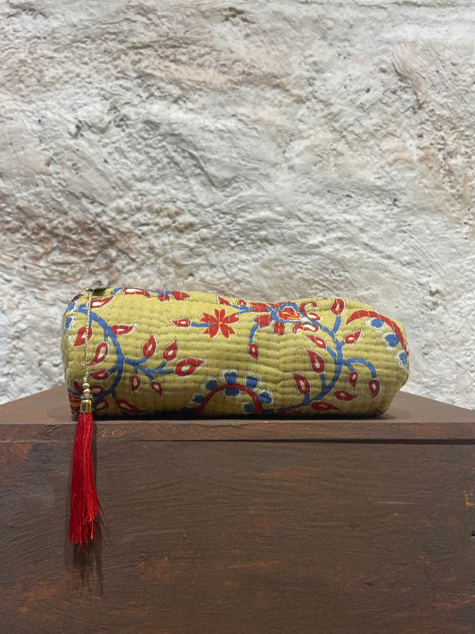 ESTUCHE PEQUEÑO ESTAMPADO MOSTAZA